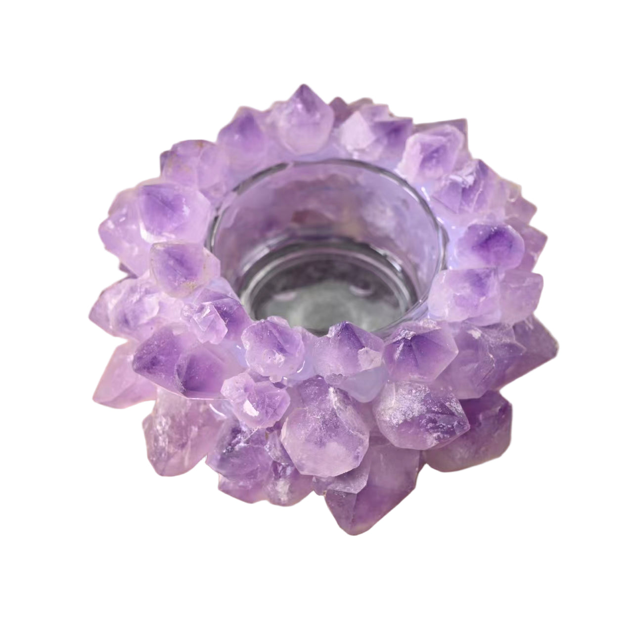 Purple crystal candle holder on a wooden surface
