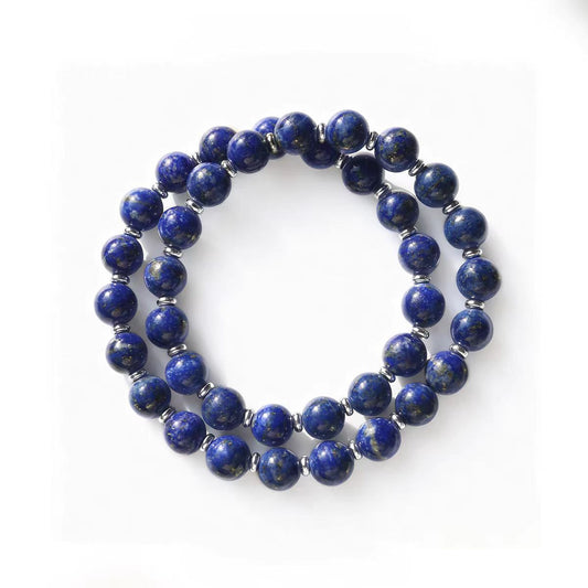 Two blue beaded bracelets on a white background
