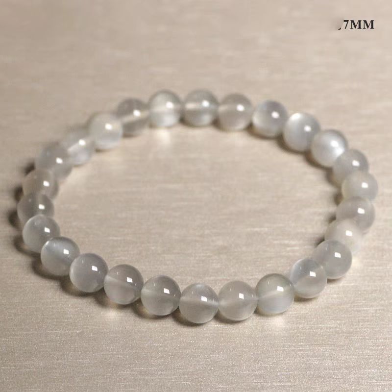 Beaded bracelet with small beads on a beige background