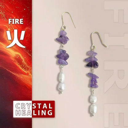 Purple and white beaded earrings on a beige background with fiery and crystal elements.