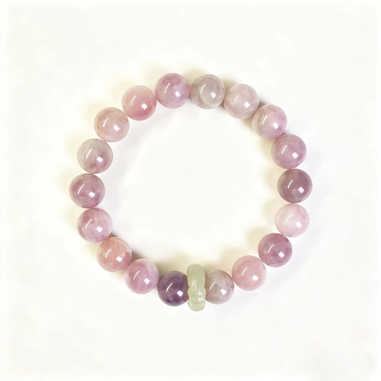 Multicolored beaded bracelet on a white background