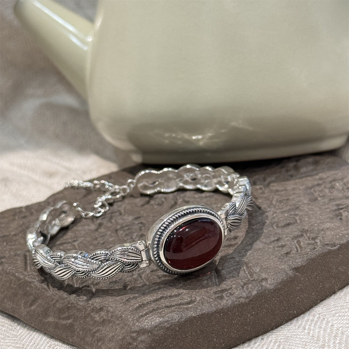 Antique Thai Silver Braided Twist Bracelet - Elegant Blood Amber Oval Cabochon, Vintage Ethnic Style Jewelry for Sophisticated Women